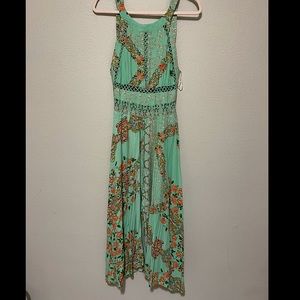 Aqua and orange sundress. Open back. Playful yet classy